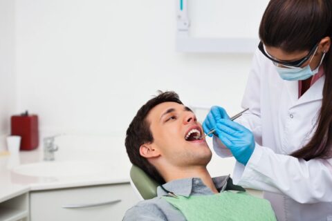 women checking teeth