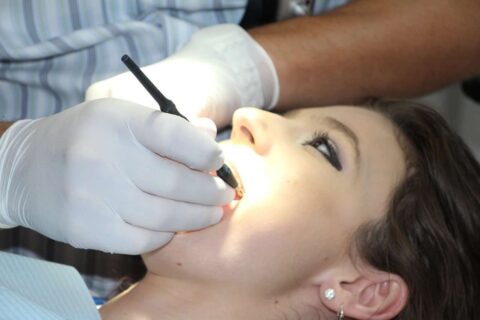 dentist checking teeth